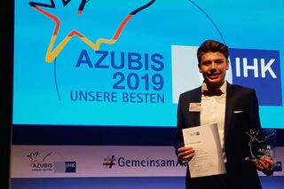 Foto vom Preisträger Thibaud Herrmann auf der Bühne 